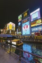 The Glico Man advertising billboard and other advertisemant in Dontonbori, Namba area, Osaka, Royalty Free Stock Photo