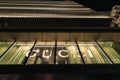 illuminated modern facade with the lettering of Gucci in Osaka, Japan, at night