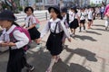 Japanese young elementary students are having field trip in Osaka Aquarium KAIYUKAN, Osaka, Japan