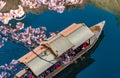 OSAKA,JAPAN-APRIL 4,2019:Tourist sightseeing Boat ride around the Osaka Castle.Cherry blossom around Osaka castle,Japan