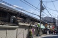 People are walking on street toward Shitennoji in Osaka Tennoji