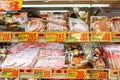 Closeup hams and processed meat in packs for sale in Japan supermarket`s freezer