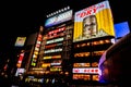 Colorful and eye-catching advertising neon signs billboards at Dotonburi area in night time.