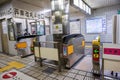 View of entrance automatic ticket machines with train security booth