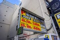 Japan time signs and prices of coins parking lots services.