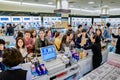 Osaka, Japan - 4 Mar 2018: Tourists and Travelers listen and negotiate with sales in duty free shop, Oaska, Japan Royalty Free Stock Photo
