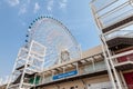 Tempozan Giant Ferris Wheel is located next to Osaka Aquarium Kaiyukan. The wheel has a height of 112.5 meters. Royalty Free Stock Photo