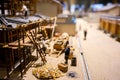 Closeup miniature models and toys of Japanese worker building a house