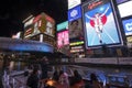 The Glico Man advertising billboard and other advertisemant in Dontonbori, Osaka Royalty Free Stock Photo