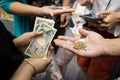 Osaka japan - november8,2018 : unidentified people counting japanese yen coint and banknote in osaka city market