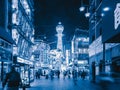 Osaka, Japan- 01/03/ 2020: Street view of shops near Shinsekai and Tsutenkaku tower in Osaka downtown at night, urban city