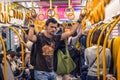 Osaka - June 01, 2019: Western traveler communting in the subway of Osaka, Japan