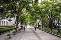 Passers by in Osaka streets and parks during a hot summer day, Central Osaka, Nakanoshima Island, Japan,