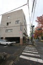 Neighbourhood, residential, area, town, building, property, house, road, architecture, wall, street, sky, facade, apartment, tree,