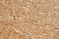 OSB oriented strand board, rough surface of chipboard recycled wood