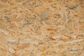 OSB pressed sawdust board,wood chips,wooden texture beckground,seamless surface Royalty Free Stock Photo