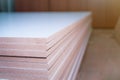 OSB sheets are stacked in a hardware store. The building material is wood Royalty Free Stock Photo