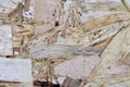 OSB material texture - recycled compressed wood shavings plate, plywood texture Royalty Free Stock Photo