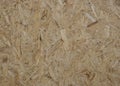 OSB texture. Wood texture. Finishing material. Background of brown OSB.