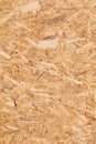 OSB Wooden panel texture. Pressed yellow orange brown wood shavings background