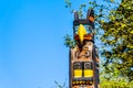 The `Oscar Maltipi Totem Pole` is located in Stanley Park, Vancouver, Royalty Free Stock Photo