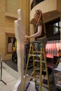 An Oscar statue is painted prior to the Academy Awards