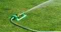 Oscillating Sprinkler Garden Watering System. Royalty Free Stock Photo