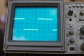 Oscilloscope signals a square wave on the display. instrument for measuring electrical signals in a circuit. tool for managing