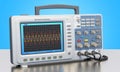 Oscilloscope on the table, 3D rendering Royalty Free Stock Photo