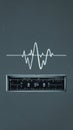 Oscilloscope waveform signal audio frequency retro minimal display close up oscilloscope screen with white waveform line grey Royalty Free Stock Photo