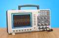 Oscilloscope on the wooden table, 3D rendering Royalty Free Stock Photo