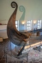 Oseberg ship excavated from ship burial archeological site, exhibited in Viking Ship Museum on Bygdoy peninsula of Oslo, Norway Royalty Free Stock Photo