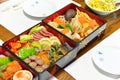 Osechi, traditional Japanese New Year food, in black lacqueware boxes Royalty Free Stock Photo