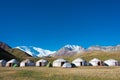 Morning Landscape of Lenin Peak 7134m at Tourist Yurt camp of Tulpar Kol Lake in Alay Valley, Osh, Kyrgyzstan.