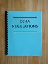 OSHA Ocuupational Safety and Health Administration manual on a desk Royalty Free Stock Photo