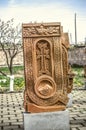 Stone cross carved with ornaments in the form of the first letter of the Armenian alphabet, created by Mesrop Mashtots in the vill