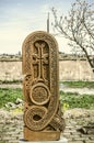 Stone cross carved with ornaments in the form of the seventeenth letter of the Armenian alphabet,created by Mesrop Mashtots in th