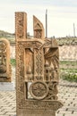 Stone cross carved with ornaments in the form of the seventh letter of the Armenian alphabet, created by Mesrop Mashtots in the v