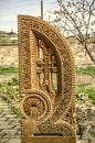 Stone cross carved with ornaments in the form of the twenty-seventh letter of the Armenian alphabet, created by Mesrop Mashtots