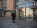 Oslo, Norway April 2017: Man walk outside the oslo university ho