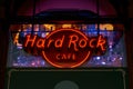 Neon light of the logo of Hard Rock cafe at night.