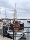 Oslo, Norway - April 7, 2018: Sailing boats in Aker Brygge pier Royalty Free Stock Photo