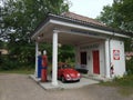 Oslo, Norway. August 25, 2017: Norwegian Folk Museum Norsk Folkemuseum. Retro gas station with red car and gas stations Royalty Free Stock Photo