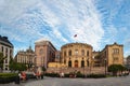 Oslo, Norway-August 1, 2013: Stortinget Parliament building Oslo Norway with beautiful fine light clouds. People rest on the