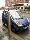 Oslo, Norway -06.24.2012: blue electric car charging