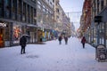 Oslo, Norway - City street covered in snow with Christmas decorations