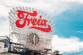 Oslo, Norway. Close Up The Freia Sign. Old Commercial Sign For The Norwegian Chocolate Freia. Big Town Clock.
