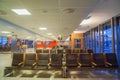 Oslo / Norway - December 1 2018: passenger seats in Gardermoen airport terminal for waiting flight departure Royalty Free Stock Photo