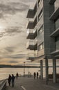 Oslo, Norway, Europe - a sunset, view from Aker Bigge; modern building.