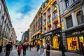 OSLO, NORWAY: People walking around in Karl Johans Gate, the famous street of Oslo in the evening Royalty Free Stock Photo